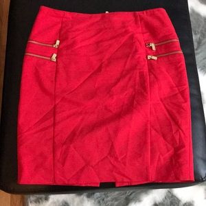 Coral skirt with gold zippers